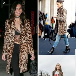 MIKAI  ANIMAL PRINT COAT SIZE SMALL WITH ZIPPER